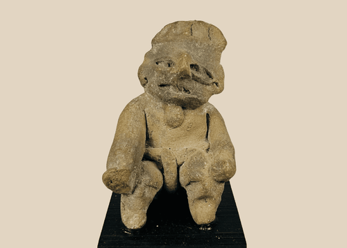 Pre-Columbian Nayarit or Jalisco terracotta burial figure with recessed eyes, strong nose ridge, and sculpted headdress
