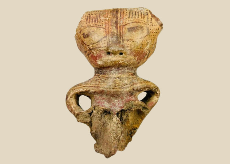 Ancient Pre-Columbian West Mexican terracotta figurine fragment, dating circa 300 BCE–300 CE, depicting a stylized human figure with incised facial features, hollow body form, and traces of red pigment; culturally significant artifact from early shaft tomb traditions, showing archaeological wear and breakage consistent with great age.