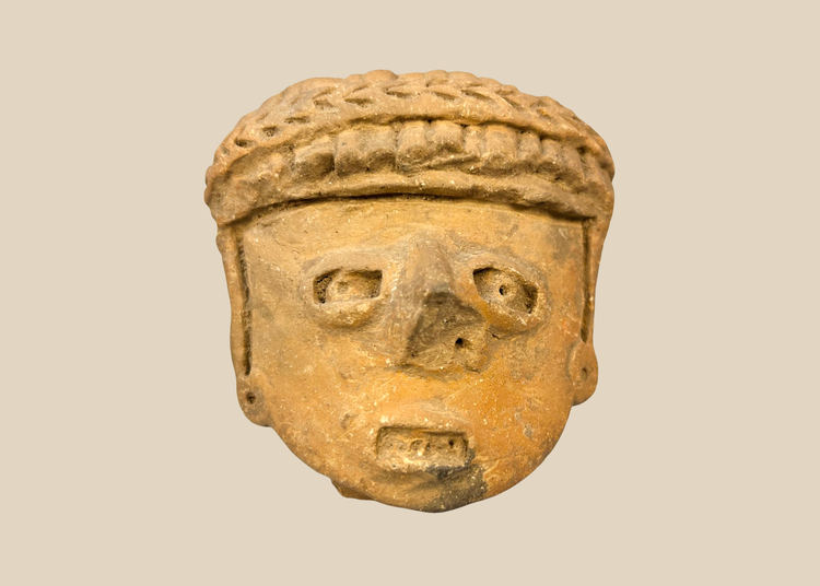 Pre-Columbian West Mexican terracotta head fragment on museum display stand
