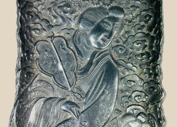 Antique Qing Dynasty cast metal scholar’s tray intricately decorated with figures of Daoist immortals among swirling cloud motifs, featuring detailed robes, flowing hair, and symbolic patterns; used as a scholar’s desk accessory for brushes or offerings, with dark aged patina highlighting fine craftsmanship from 18th–19th century China.