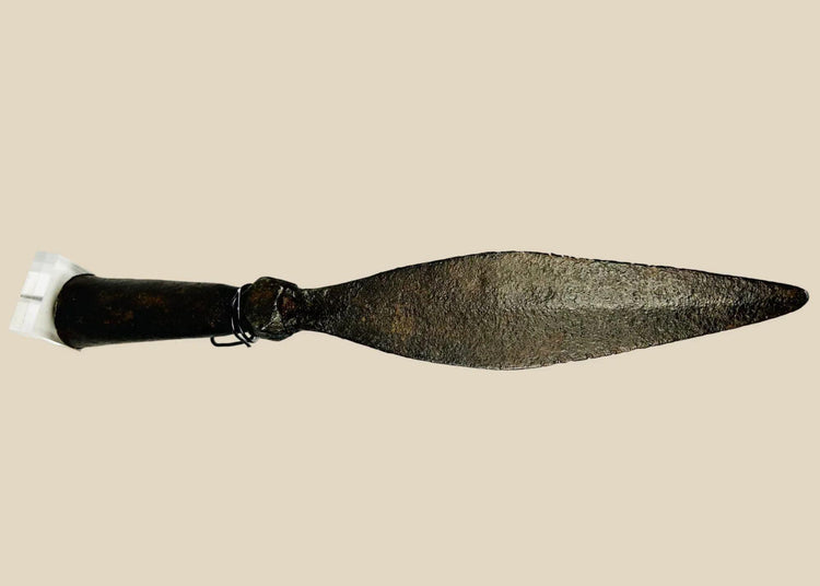 Chinese iron spearhead from the Qing Dynasty, 18th century, featuring a broad leaf-shaped blade, socketed base, square stopper, and natural wood shaft. Elite Eight Banners military weapon with patina from age and use, reflecting Qing martial traditions, tactical design, and imperial warrior culture.