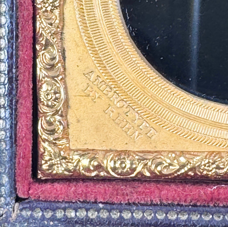 Nineteenth-century glass ambrotype portrait housed in a velvet-lined leatherette case