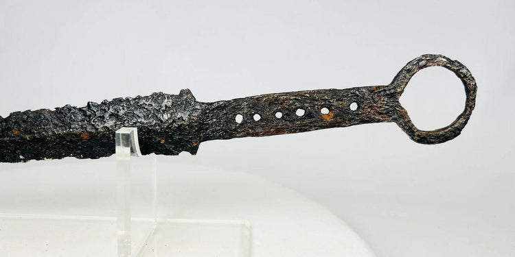 14th-century medieval European quillon dagger with tapered blade, crossguard, and ring pommel, forged steel and iron construction with aged patina.