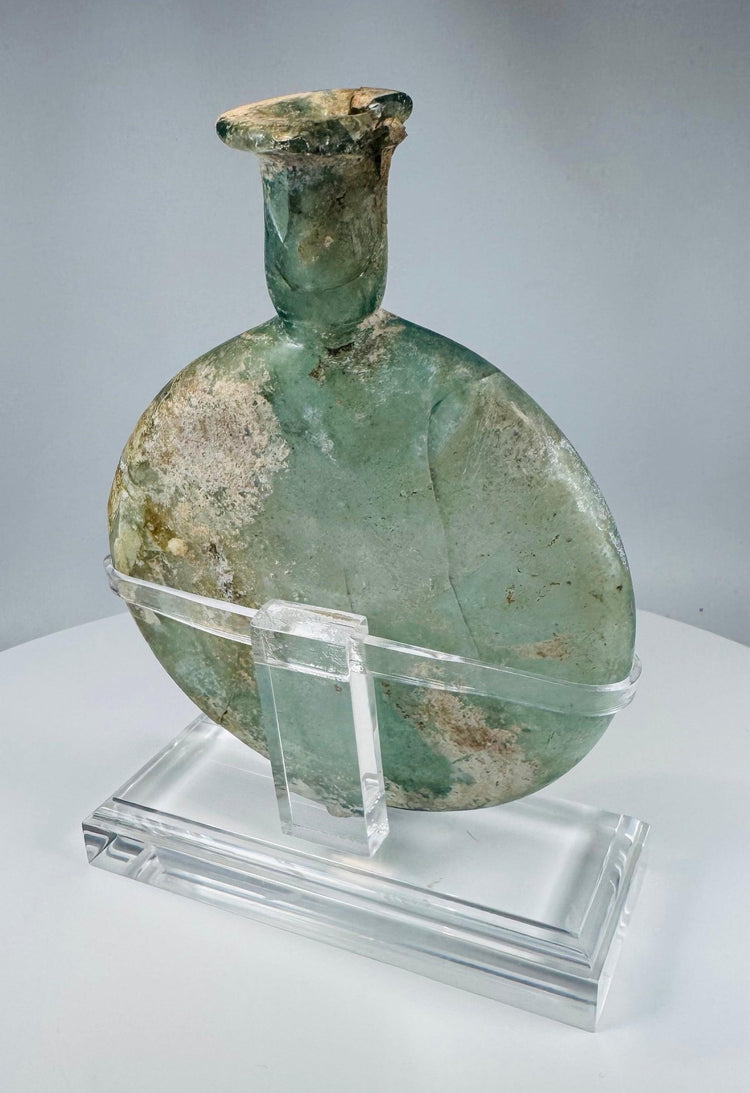 Ancient Roman pale green glass container with flared rim and custom display stand
