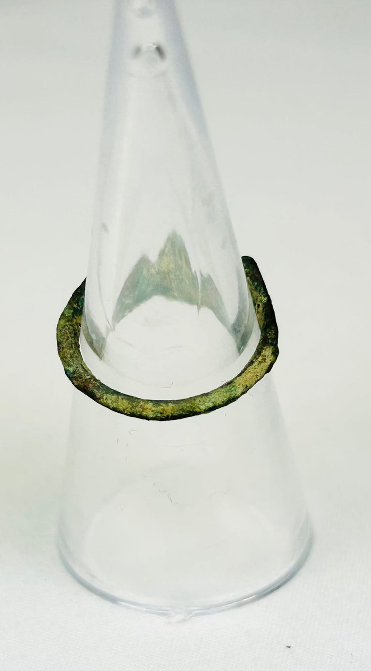 Back view of 2nd-century Roman bronze ring showing sculpted shoulders and gemstone clarity