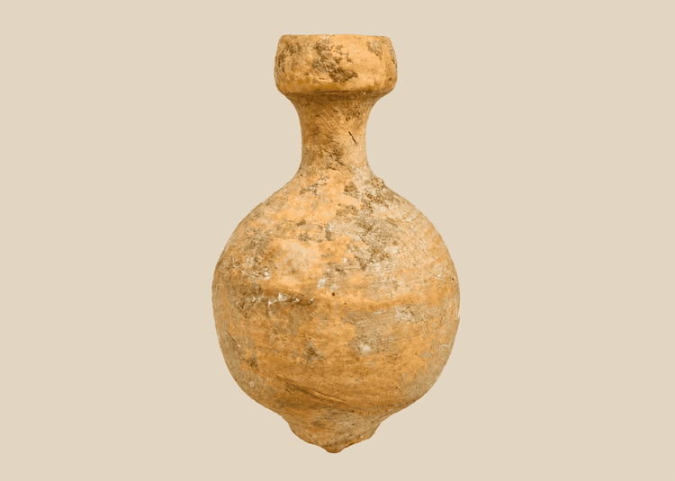 Ancient Roman terracotta oil vessel with globular body and mineral encrustation