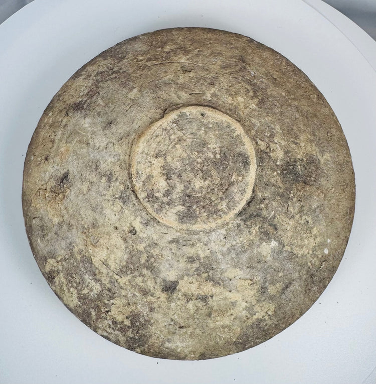 Roman Imperial terracotta household bowl excavated from North Africa displaying original white slip and burial patina.