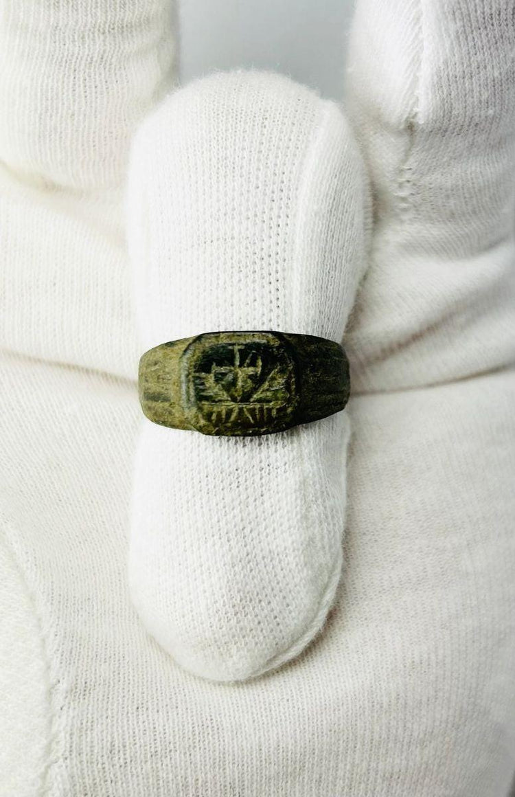 Roman ring engraved with Chi-Rho Christogram, early Christian symbol, bronze or base metal, 1st–4th century CE, showing fine Roman craftsmanship and preserved patina.