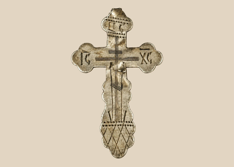 Antique Russian Orthodox silver devotional cross with engraved crucifix and trefoil terminals