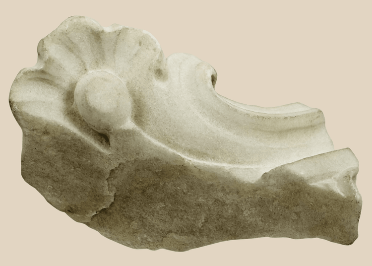 Baroque marble architectural fragment from the Church of San Domenico in Noto, Sicily, featuring carved floral ornamentation.