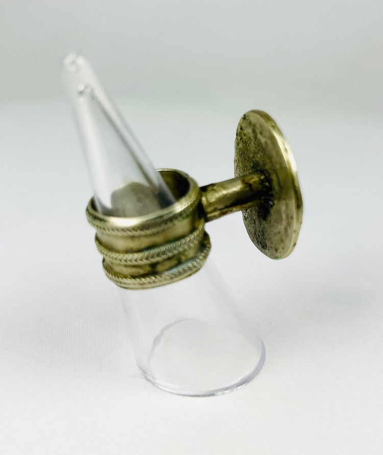Silver ring with raised rosette motif, beaded border, and period-correct design.