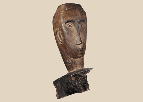 Antique Southeast Asian carved hardwood figure fragment with expressive stylized facial features