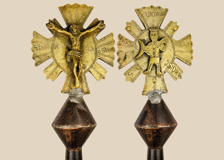 Double-sided Spanish Colonial processional cross finial in cast and engraved brass with iron shaft, featuring Christ on the cross with sunburst rays on one side and a saint holding a fish on the reverse, Latin America (Peru or Bolivia), 18th–19th century