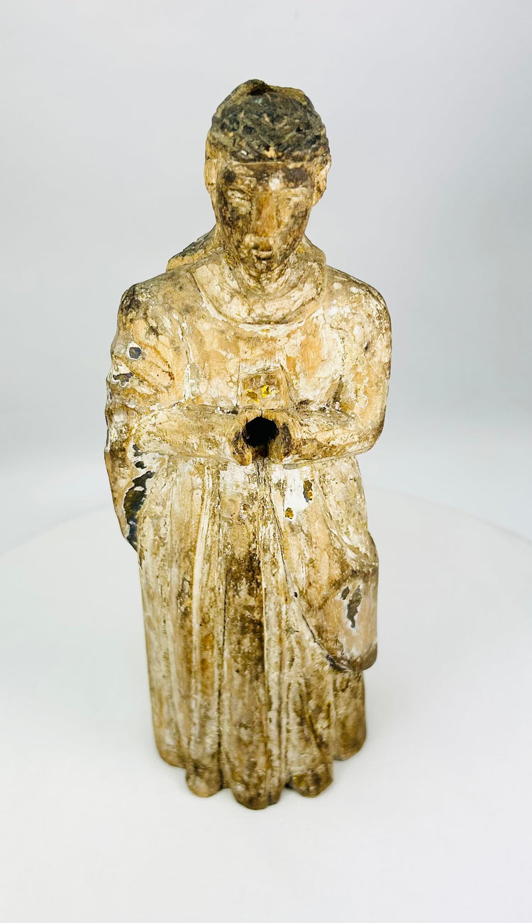 Spanish or Spanish Colonial carved wooden Santos relic symbolizing lived faith