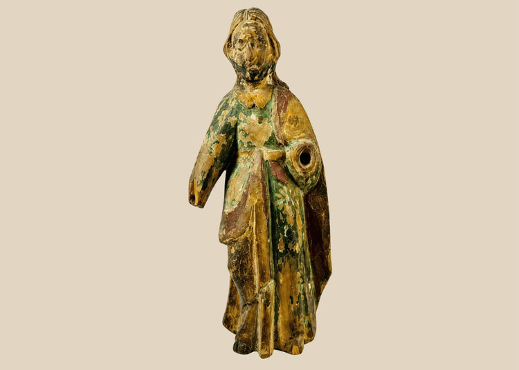 17th–18th century Spanish Colonial wooden statue of a saint or religious figure, hand-carved with flowing drapery and expressive face. Remnants of polychrome paint, surface wear, and a missing arm reflect centuries of devotional use in churches, chapels, or private altars, showcasing Colonial religious artistry.