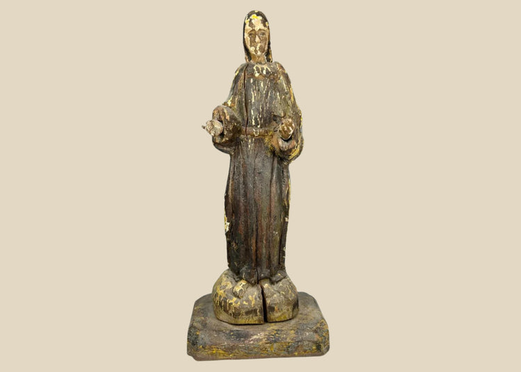 Antique Spanish Colonial wooden devotional statue, circa 18th–19th century, hand-carved with open hands in blessing pose, mounted on pedestal, with remnants of original gilt and polychrome paint, patina, and wear from centuries of use.