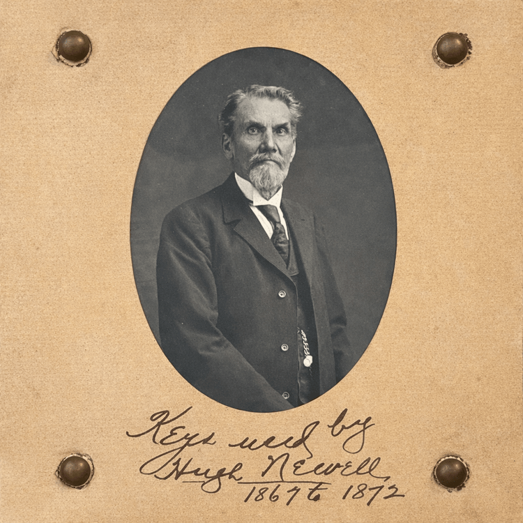 Victorian-era key collection with watchman Hugh Newell portrait