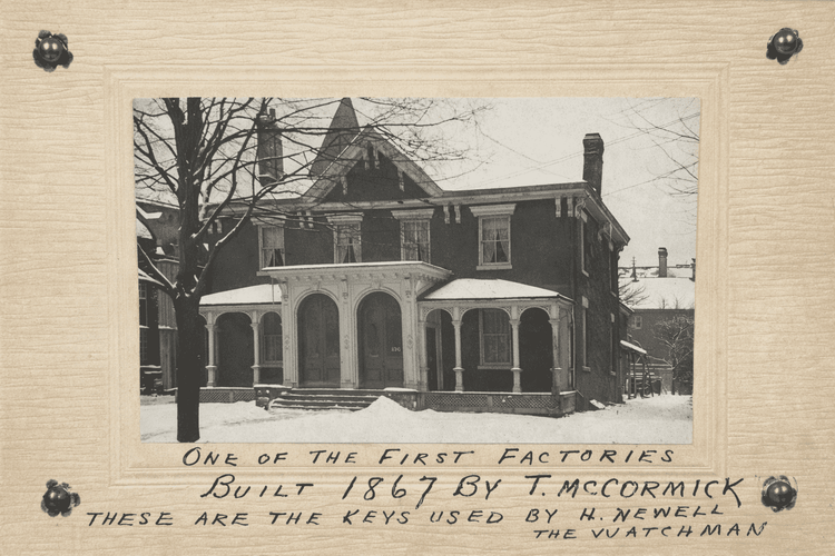 Framed 1867 T. McCormick factory photograph with handwritten watchman key provenance label