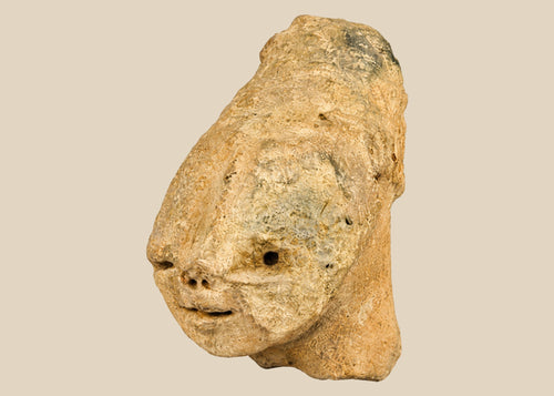 Ancient Bura culture terracotta head from Niger, West Africa, circa 300–1100 CE. Stylized lips, flat nose, and subtle rear ornamentation with natural patina. Likely created for ceremonial or funerary purposes, reflecting the symbolic, abstract artistry and spiritual traditions of early West African societies.