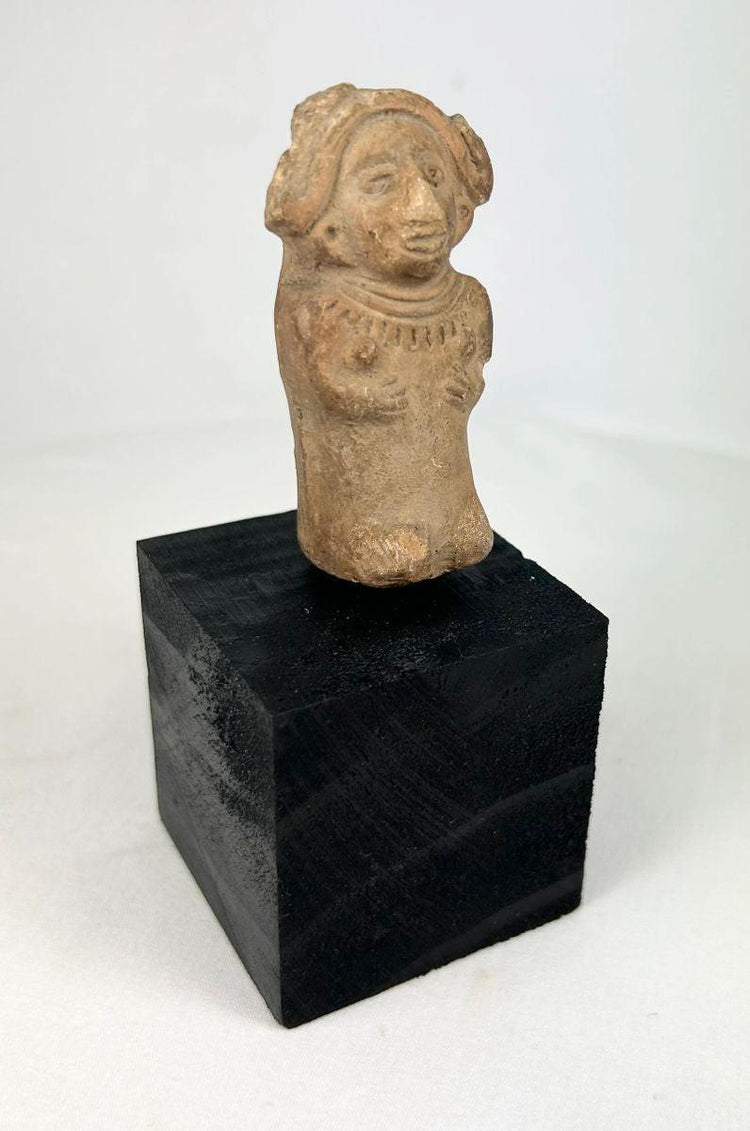 Ancient Veracruz terracotta figurine of a seated female with flaring headdress, almond-shaped eyes, and necklace, circa 600–900 CE, Late Classic period, mounted on black display base.
