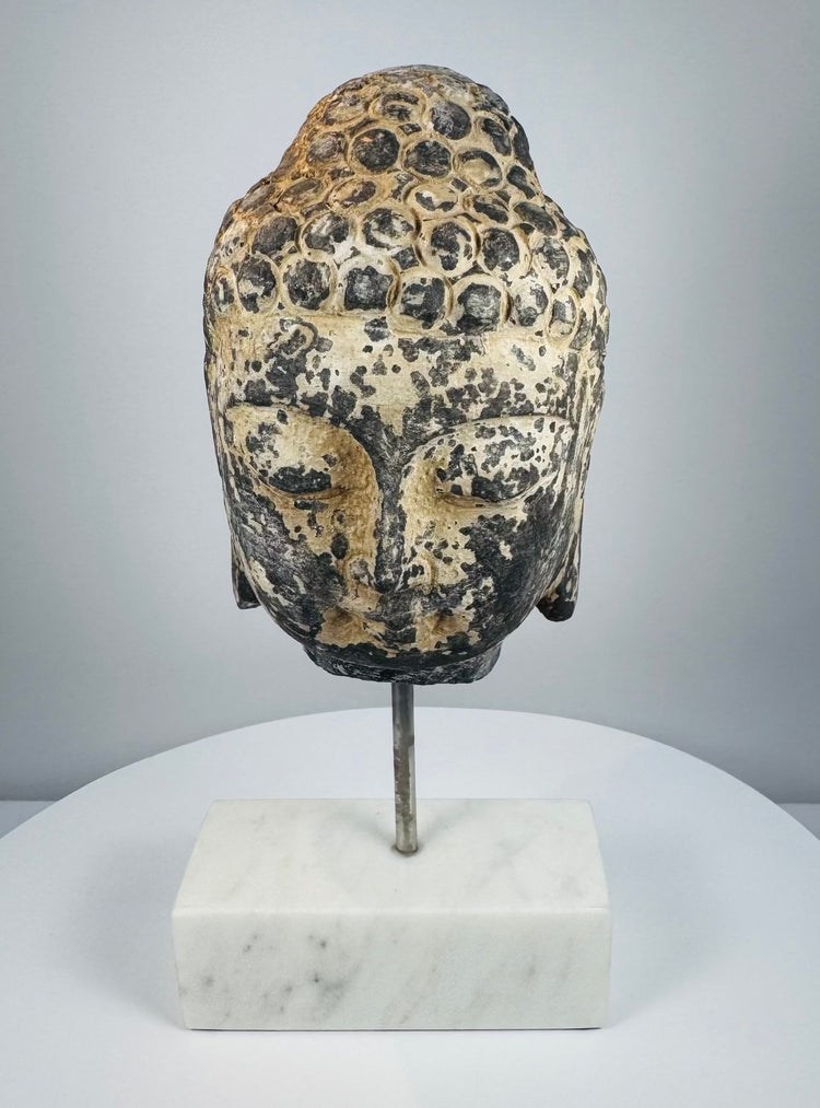 Antique Southeast Asian carved stone Buddha head with traces of pigment, 18th–19th century