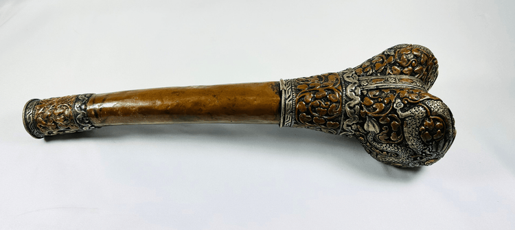 Antique Tibetan Kangling ritual trumpet crafted from human tibia with ornate silver and turquoise inlay, used in Buddhist chöd ceremonies – photographed on white background – Relic & Rarity