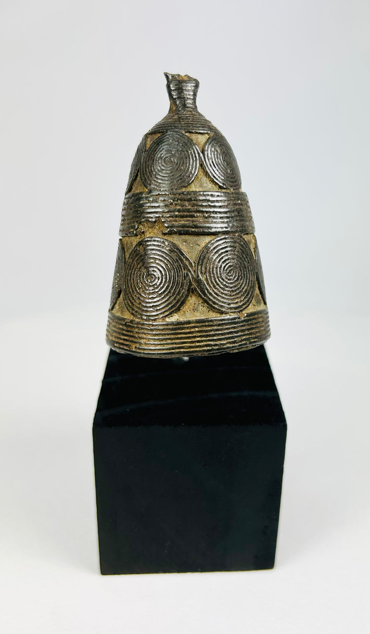 Late 19th–early 20th century Tibetan Buddhist bronze ritual bell (ghanta) with lotus petal base, vajra-finial handle, original iron clapper, dark patina from ritual use, used in Vajrayana ceremonies