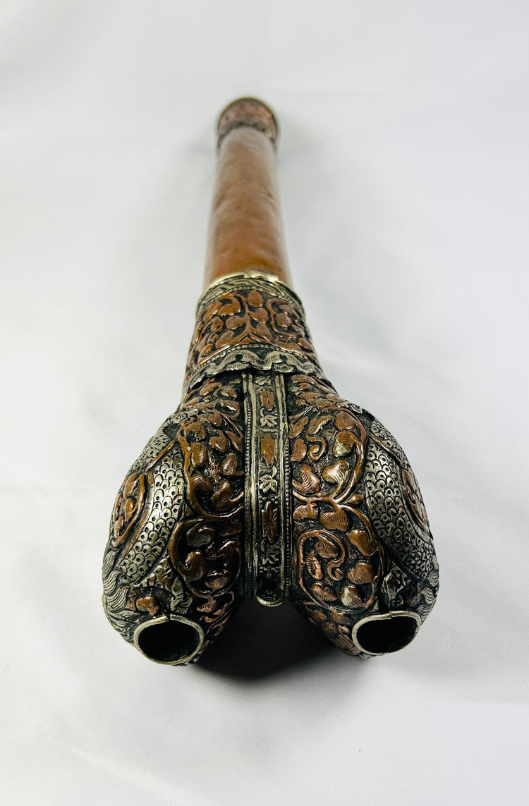 Rare Tibetan Kangling made from human tibia with silver fittings and turquoise inlay, used in chöd and funerary ceremonies, 19th–early 20th century, 13.5 inches long, with engraved dragon and foliate motifs, ceremonial ritual trumpet for Tibetan Buddhist practice