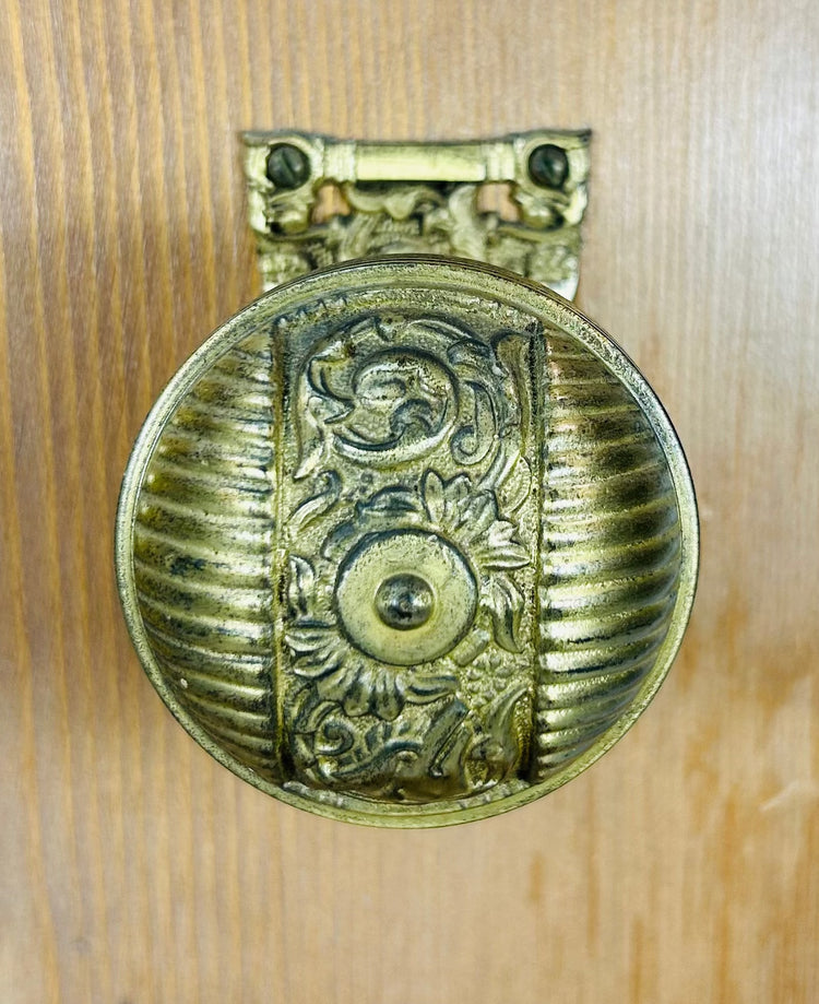 Vintage lock and hinge display with decorative Victorian style brass hardware