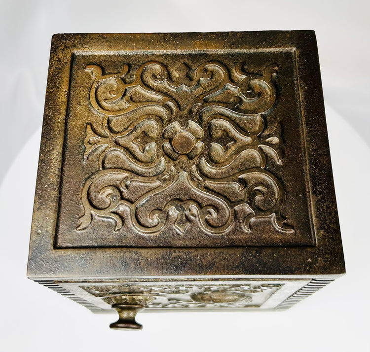 Antique novelty safe bank with embossed lettering and Victorian design