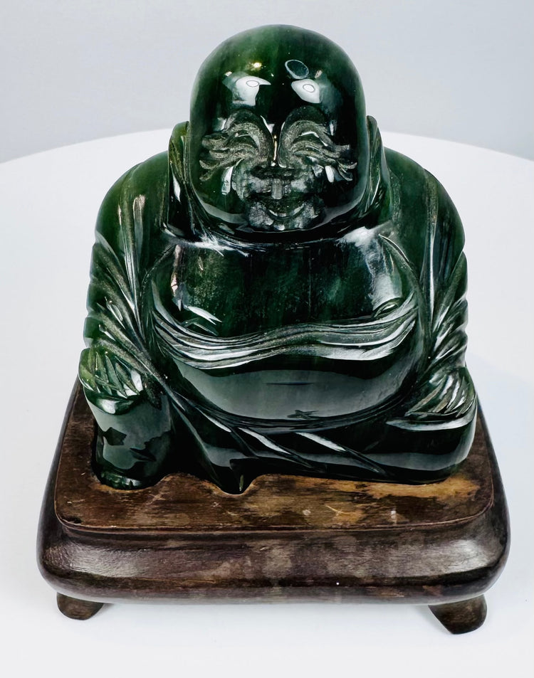 Front detail of vintage Chinese Budai Laughing Buddha hardstone sculpture with expressive facial carving