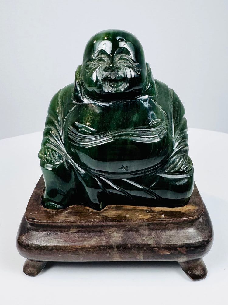 Chinese Budai hardstone carving showing smiling face, exposed belly and detailed flowing robes