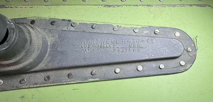 Authentic Cold War-era USAF Boeing 737 cargo door with military insignia, lettering and operational stencils