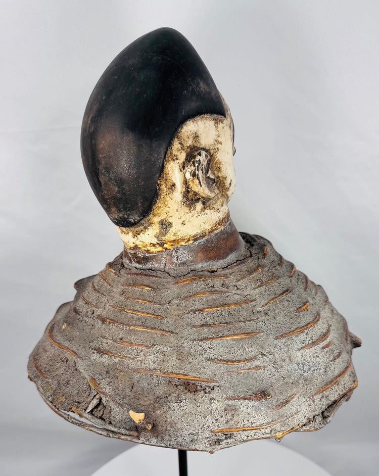 Historic Yoruba ceremonial headdress mounted on a woven wicker support used in Egungun ancestor-veneration festivals.