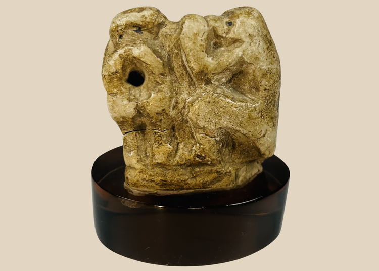 Ancient Egyptian carved limestone baboon figure associated with the god Thoth from the Late Period.