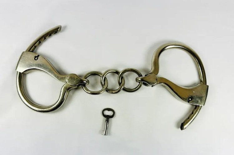 John J. Tower Adjustable Handcuffs with Key | United States | 1866–1940s