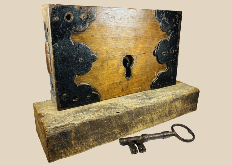 Early 19th century wooden rim lock with iron fittings and skeleton key