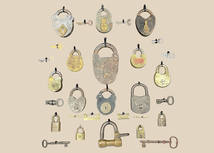 Vintage locks and keys display featuring 18 locks and 12 keys in frame
