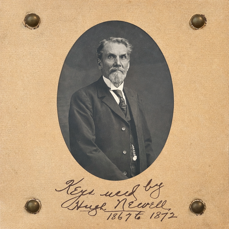 Victorian-era key collection with watchman Hugh Newell portrait