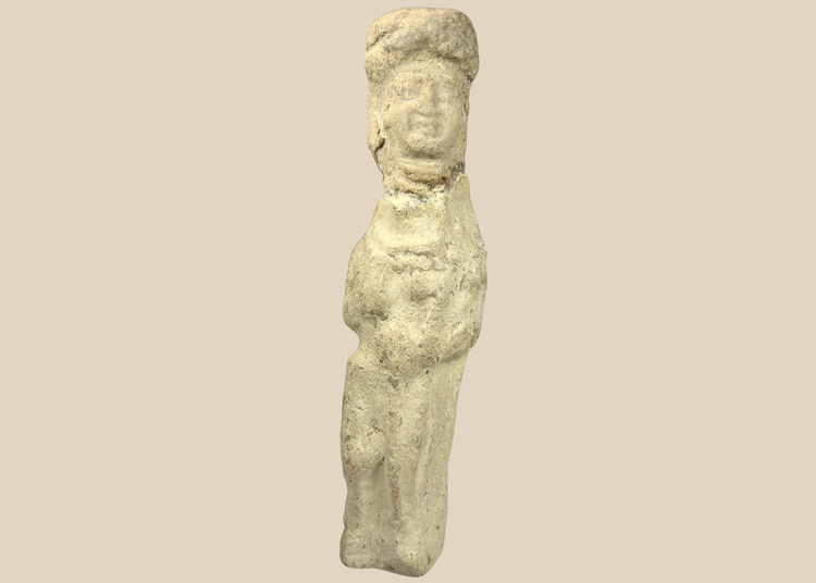 Ancient Mesopotamian terracotta female figurine with folded arms