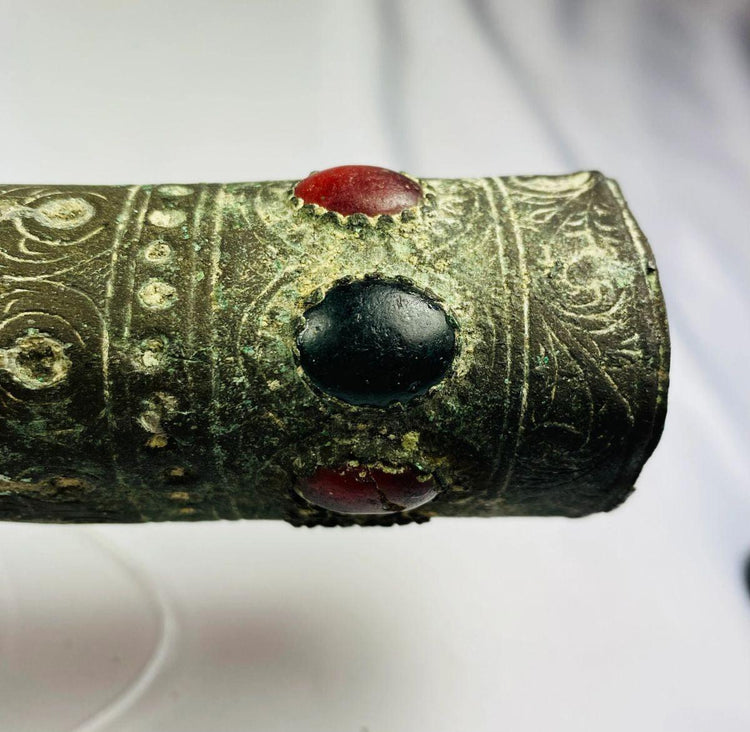 Dense, smooth, spherical stone object from ancient South Asia, likely used as a grinding or pounding tool, circa 2nd millennium BCE, showing natural patina and wear.