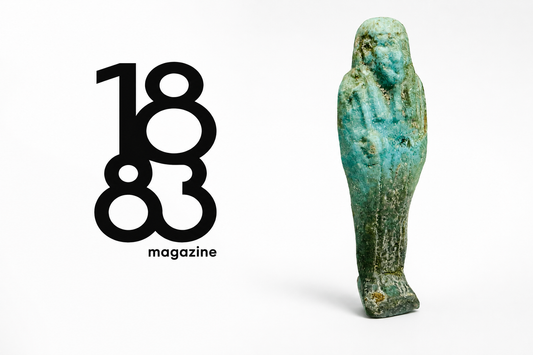1883 Magazine logo beside an ancient Egyptian faience ushabti featured by Relic & Rarity.