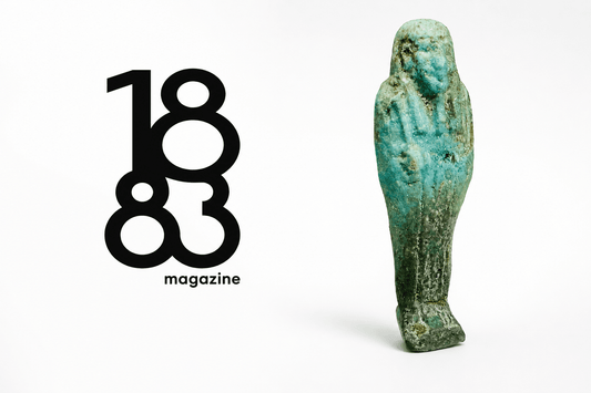 1883 Magazine logo beside an ancient Egyptian faience ushabti featured by Relic & Rarity.
