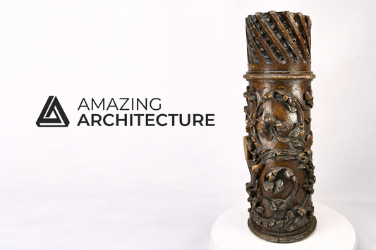 Amazing Architecture publication logo displayed beside a carved antique wooden architectural fragment from the Relic & Rarity collection.