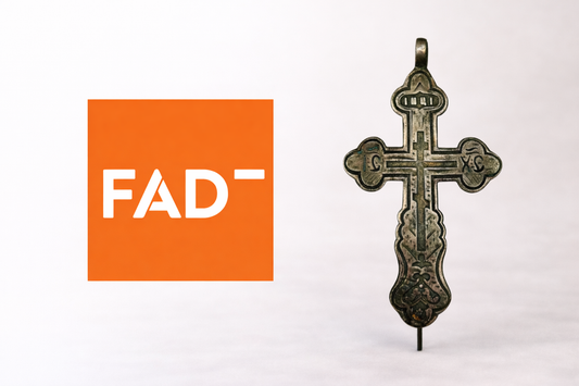 FAD Magazine arts and culture publication logo displayed beside an antique Russian Orthodox silver cross circa 18th century from Relic & Rarity.