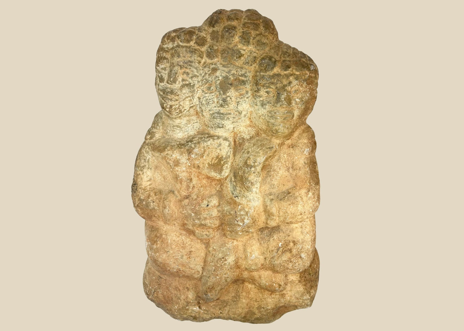Majapahit Era three-faced stone sculpture of Brahma from 14th–15th century Java, carved from volcanic andesite, featuring serene tri-directional faces and a tiered crown, part of Cecil Blocker Collection, Indonesia.