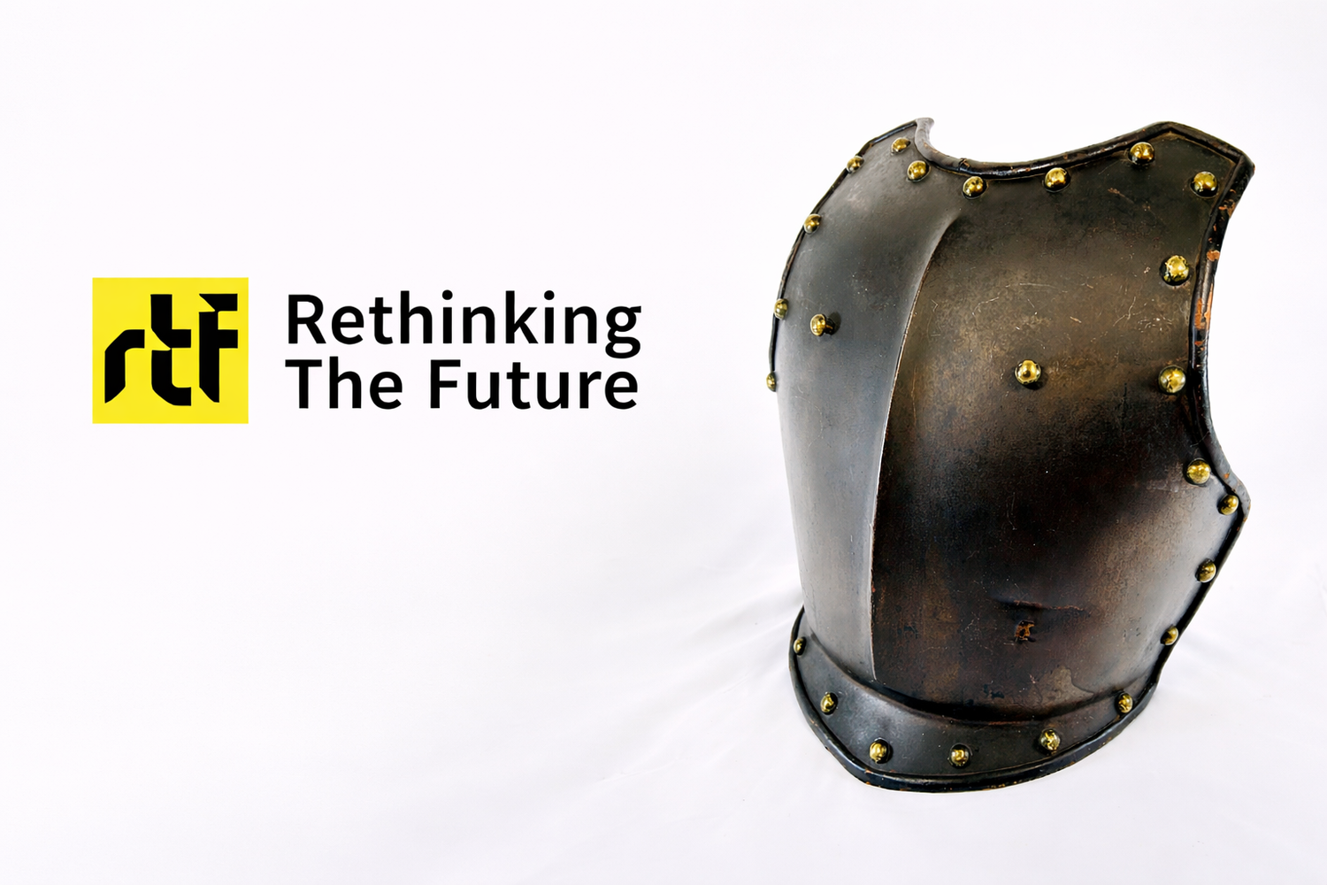 Rethinking The Future architecture publication logo displayed beside a historical steel breastplate armor with brass rivets against a neutral studio background.