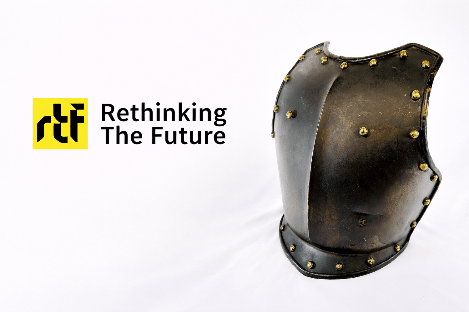 Rethinking The Future architecture publication logo displayed beside a historical steel breastplate armor with brass rivets against a neutral studio background.