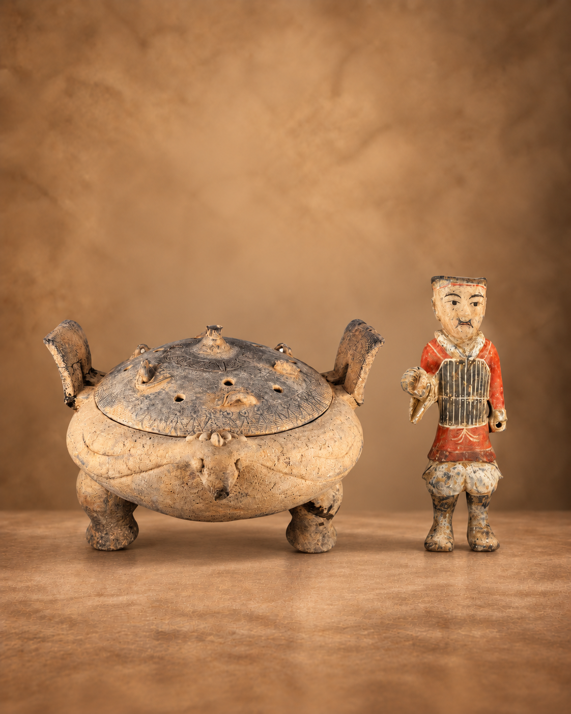 Ancient Chinese Han Dynasty painted terracotta soldier and ding-form ritual censer displayed in the Relic & Rarity Ancient Chinese collection.