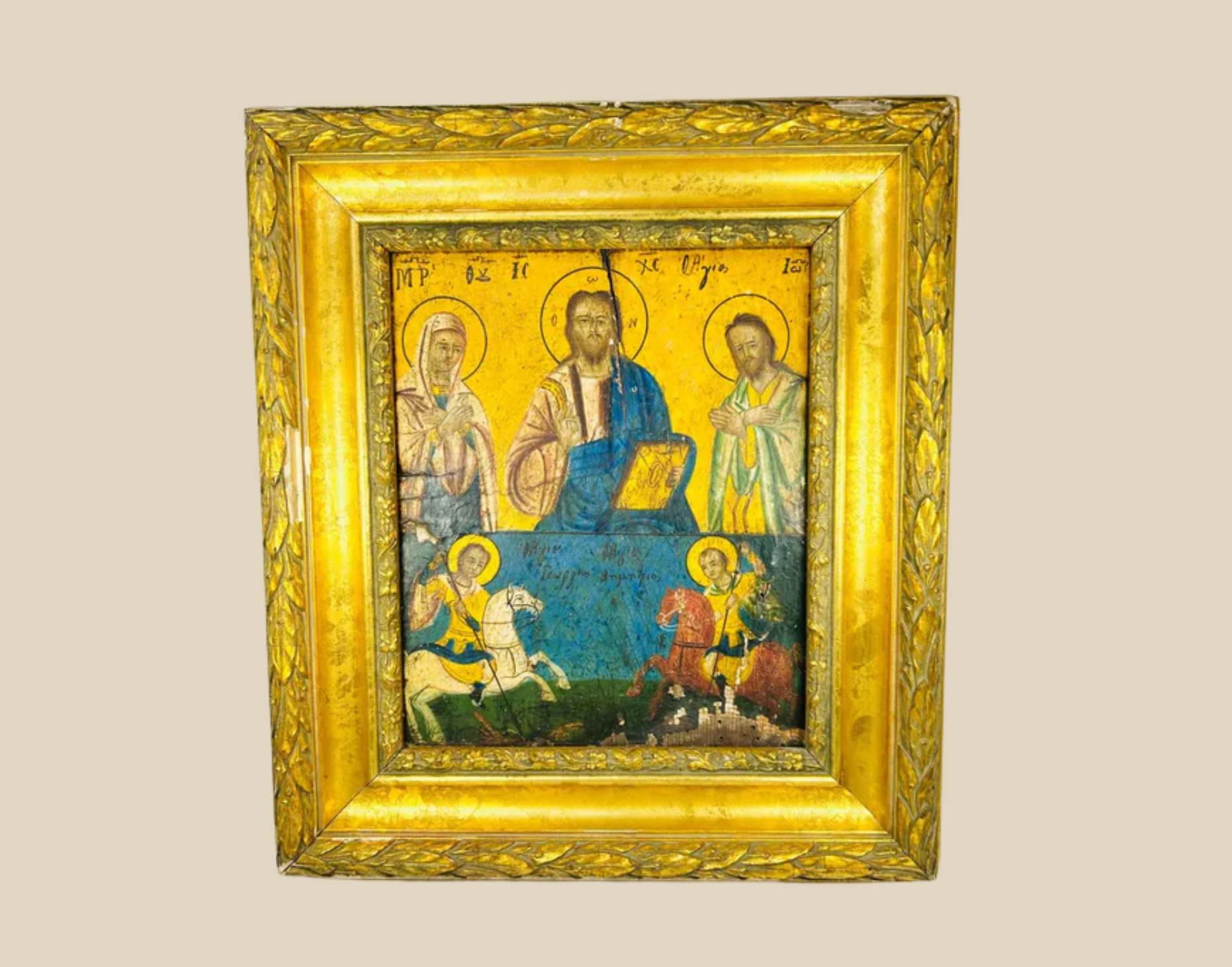 18th-century Russian Orthodox icon depicting Christ, the Virgin Mary, and John the Baptist above two mounted saints, hand-painted in vibrant tempera with gilded background and ornate gold frame